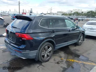 2018 Volkswagen Tiguan Wolfsburg Edition with VIN 3VV5B7AX7JM154967, listed as a IAAI auction lot 41433312 with 61,679 mi miles. Bid and sale history available at carsss.com. Image 4.