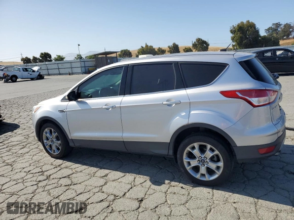 2013 Ford Escape SEL с VIN 1FMCU9H97DUD80585, выставлен на аукционе Copart как лот 60882115 с пробегом 171 254 миль миль и Чистый • Clean title. История ставок и продаж доступна на DreamBid. Изображение 2.