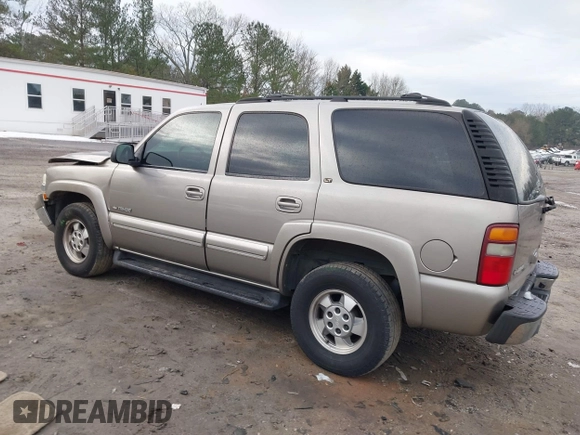 2002 Chevrolet Tahoe LT with VIN 1GNEC13Z22J256805, listed as a IAAI auction lot 41302460 with 249,578 mi miles and . Bid and sale history available at DreamBid. Image 3.