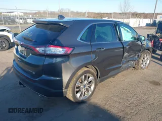 2015 Ford Edge Titanium with VIN 2FMPK4K87FBB77277, listed as a IAAI auction lot 41795760 with 164,844 mi miles. Bid and sale history available at carsss.com. Image 4.