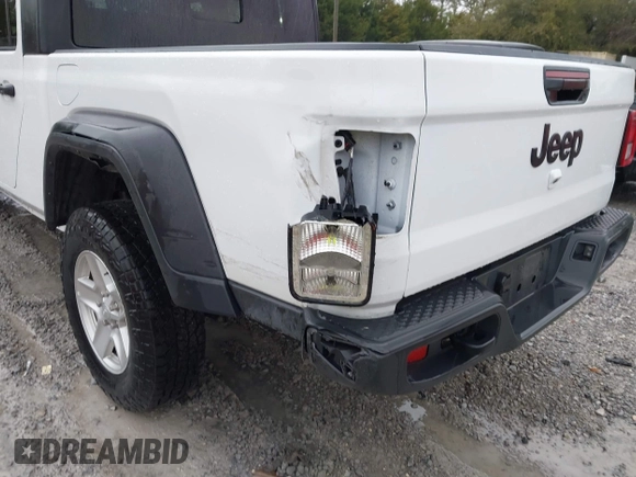 2023 Jeep Gladiator Sport S z VIN 1C6HJTAG5PL533877, wystawiony jako IAAI lot #41615284 z przebiegiem 41 191 mil mil oraz . Historia ofert i sprzedaży dostępna na DreamBid. Obrazek 6.