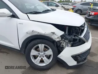 2013 Kia Sportage LX with VIN KNDPBCA21D7356092, listed as a IAAI auction lot 42111086 with 102,521 mi miles and . Bid and sale history available at carsss.com. Image 18.