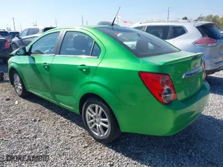 2014 Chevrolet Sonic LT with VIN 1G1JC5SB2E4227125, listed as a IAAI auction lot 40667083 with 108,963 mi miles. Bid and sale history available at carsss.com. Image 3.