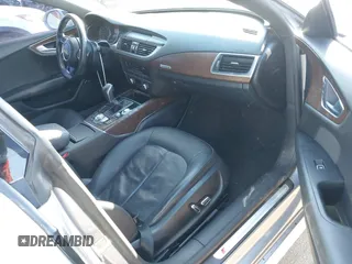 2016 Audi A7 3.0 Premium Plus with VIN WAUWGAFC8GN012047, listed as a IAAI auction lot 41012423 with 77,778 mi miles. Bid and sale history available at carsss.com. Image 5.