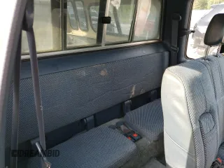 1993 Toyota Pickup DLX z VIN JT4RN93P7P5074129, wystawiony jako Copart lot #72893054 z przebiegiem 235 053 mil mil oraz Szkoda całkowita • Salvage title. Historia ofert i sprzedaży dostępna na DreamBid. Obrazek 11.