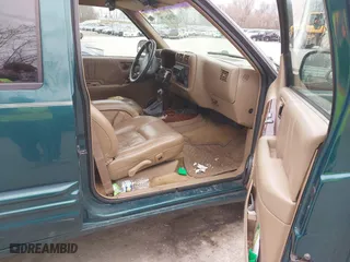 1997 Oldsmobile Bravada with VIN 1GHDT13W2V2706505, listed as a IAAI auction lot 41835475 with 131,247 mi miles. Bid and sale history available at carsss.com. Image 5.
