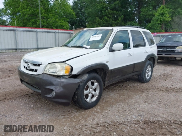 2006 Mazda Tribute i with VIN 4F2YZ02Z56KM31953, listed as a IAAI auction lot 42167223 with 185,169 mi miles and . Bid and sale history available at carsss.com. Image 2.