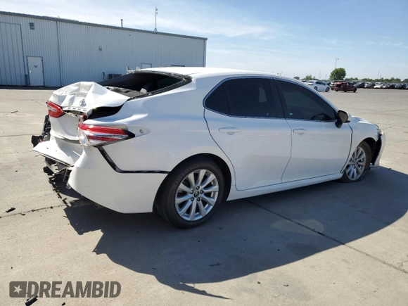 2018 Toyota Camry LE с VIN 4T1B11HK5JU073663, выставлен на аукционе Copart как лот 55656575 с пробегом 100 578 миль миль и Списание • Salvage title. История ставок и продаж доступна на DreamBid. Изображение 3.