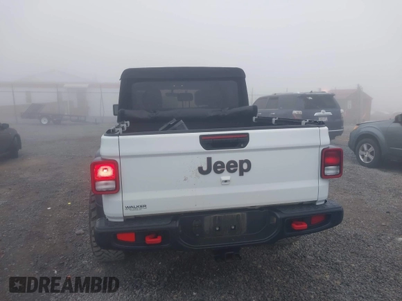 2022 Jeep Gladiator Rubicon z VIN 1C6JJTBG3NL111054, wystawiony jako IAAI lot #40793144 z przebiegiem 40 115 mil mil oraz . Historia ofert i sprzedaży dostępna na DreamBid. Obrazek 17.
