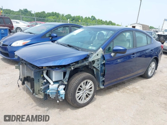 2018 Subaru Impreza Premium z VIN 4S3GKAB64J3604540, wystawiony jako IAAI lot #42424421 z przebiegiem 73 961 mil mil oraz . Historia ofert i sprzedaży dostępna na DreamBid. Obrazek 2.