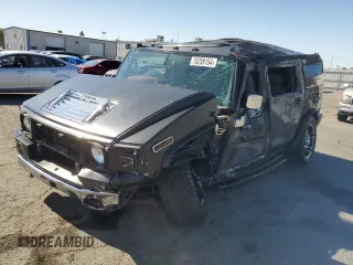 2003 Hummer H2 with VIN 5GRGN23U83H134284, listed as a Copart auction lot 70259154 with 0 mi miles and Salvage Title. Bid and sale history available at carsss.com. Image 1.