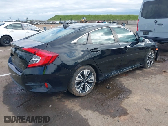 2016 Honda Civic Sedan EX-L with VIN 19XFC1F78GE201822, listed as a IAAI auction lot 41882529 with 142,589 mi miles. Bid and sale history available at carsss.com. Image 4.