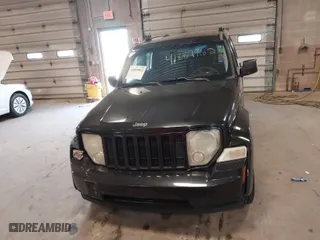 2009 Jeep Liberty Sport with VIN 1J8GN28K79W547903, listed as a IAAI auction lot 41889962 with 127,821 mi miles. Bid and sale history available at carsss.com. Image 12.