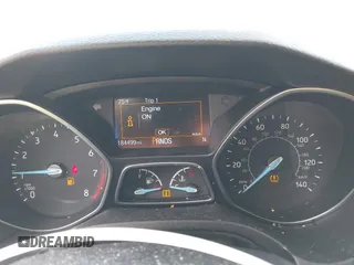 2015 Ford Focus SE with VIN 1FADP3K2XFL319559, listed as a IAAI auction lot 42205107 with 184,499 mi miles. Bid and sale history available at carsss.com. Image 7.