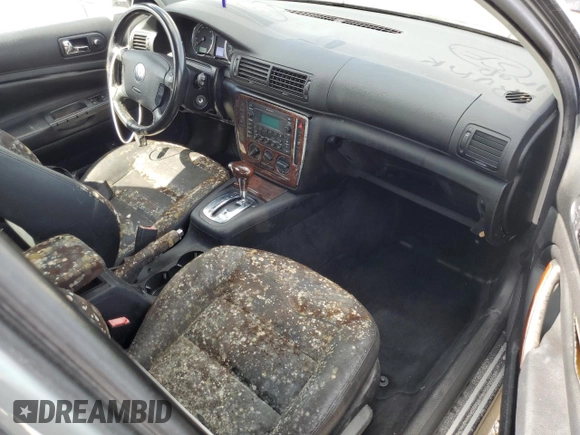 2003 Volkswagen Passat z VIN WVWPH23B03P338896, wystawiony jako Copart lot #74698014 z przebiegiem Nie podano mil oraz Nie do naprawy • Non repairable. Historia ofert i sprzedaży dostępna na DreamBid. Obrazek 8.