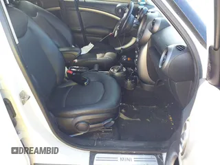 2012 MINI Countryman with VIN WMWZB3C50CWM03775, listed as a IAAI auction lot 41876928 with 151,366 mi miles and . Bid and sale history available at DreamBid. Image 5.