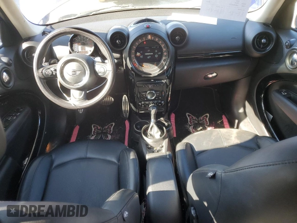 2016 MINI Countryman S with VIN WMWZC5C56GWP49392, listed as a Copart auction lot 50414005 with 90,472 mi miles and Salvage Title. Bid and sale history available at DreamBid. Image 8.