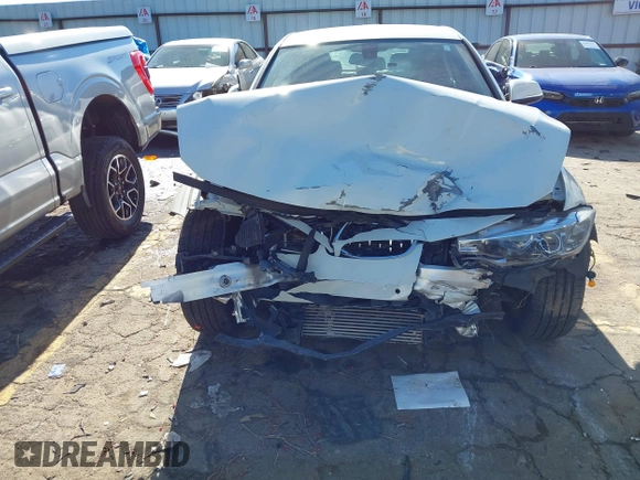 2013 BMW 3 Series 320i with VIN WBA3B1C56DF462549, listed as a IAAI auction lot 41411287 with 119,146 mi miles. Bid and sale history available at carsss.com. Image 6.