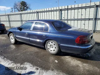 2002 Lincoln Continental with VIN 1LNHM97V82Y612492, listed as a Copart auction lot 38197414 with 198,537 mi miles and Salvage Title. Bid and sale history available at carsss.com. Image 2.