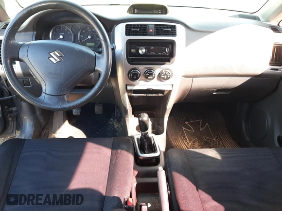 2006 Suzuki Aerio Premium z VIN JS2RC62HX65351004, wystawiony jako Copart lot #44656943 z przebiegiem Nie podano mil oraz Czysty tytuł • Clean title. Historia ofert i sprzedaży dostępna na DreamBid. Obrazek 8.