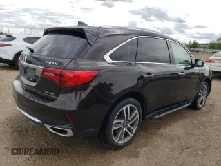 2018 Acura MDX Advance с VIN 5J8YD4H94JL000943, выставлен на аукционе Copart как лот 57906645 с пробегом 80 251 миль миль и Списание • Salvage title. История ставок и продаж доступна на DreamBid. Изображение 3.