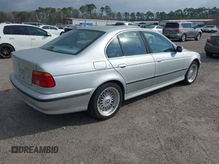 2000 BMW 5 Series 528iA with VIN WBADM6344YGU22084, listed as a IAAI auction lot 41734099 with 249,650 mi miles. Bid and sale history available at carsss.com. Image 4.