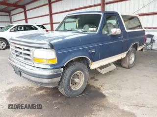 1993 Ford Bronco XL with VIN 1FMEU15N1PLB29714, listed as a IAAI auction lot 41984437 with 165,195 mi miles. Bid and sale history available at carsss.com. Image 2.