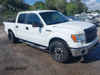 2011 Ford F-150 XL with VIN 1FTFW1CF5BFB46327, listed as a IAAI auction lot 41428258 with 215,536 mi miles. Bid and sale history available at carsss.com. Image 1.