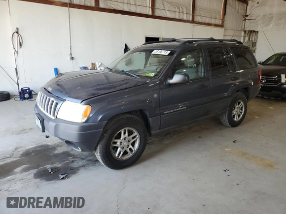 2004 Jeep Grand Cherokee Laredo z VIN 1J4GW48S14C338788, wystawiony jako Copart lot #53136715 z przebiegiem 150 352 mil mil oraz Szkoda całkowita • Salvage title. Historia ofert i sprzedaży dostępna na DreamBid. Obrazek 1.