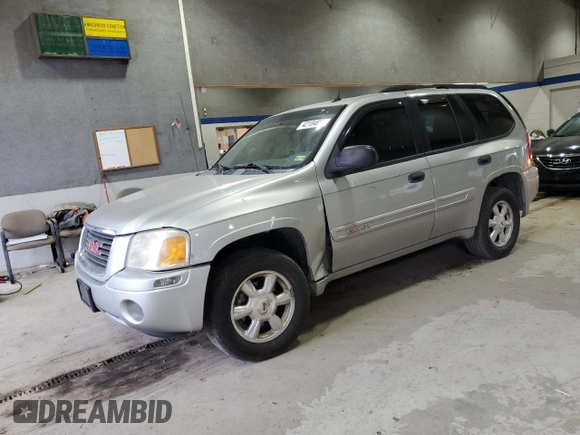 2005 GMC Envoy SLT with VIN 1GKDT13S652197929, listed as a Copart auction lot 42104855 with 228,515 mi miles and Salvage Title. Bid and sale history available at carsss.com. Image 1.