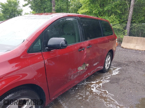2014 Toyota Sienna L with VIN 5TDZK3DC0ES457242, listed as a IAAI auction lot 42307360 with 86,857 mi miles and . Bid and sale history available at DreamBid. Image 6.