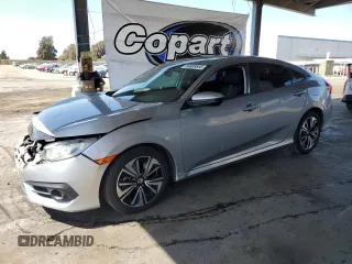 2016 Honda Civic EX-T z VIN 19XFC1F38GE222215, wystawiony jako Copart lot #58805855 z przebiegiem 132 849 mil mil oraz Szkoda całkowita • Salvage title. Historia ofert i sprzedaży dostępna na DreamBid. Obrazek 1.
