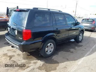 2005 Honda Pilot EX-L with RES with VIN 2HKYF18605H545609, listed as a IAAI auction lot 41626754 with 235,647 mi miles. Bid and sale history available at carsss.com. Image 4.