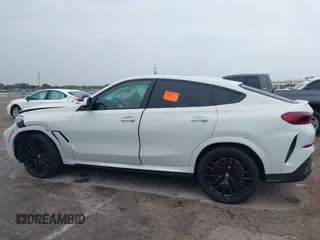 2021 BMW X6 xDrive40i z VIN 5UXCY6C00M9F88215, wystawiony jako IAAI lot #41646498 z przebiegiem 43 587 mil mil oraz . Historia ofert i sprzedaży dostępna na DreamBid. Obrazek 14.
