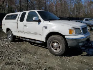 1999 Ford F-150 XL with VIN 1FTRX18L1XNB18305, listed as a Copart auction lot 51336985 with 173,904 mi miles and Clean Title. Bid and sale history available at carsss.com. Image 4.