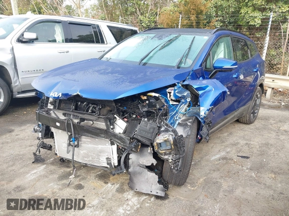 2024 Kia Sportage SX-Prestige with VIN 5XYK53DF5RG227234, listed as a IAAI auction lot 41224211 with 7,155 mi miles and . Bid and sale history available at DreamBid. Image 2.