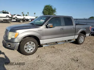 2010 Ford F-150 XL with VIN 1FTEW1C89AFA56934, listed as a Copart auction lot 52235735 with 298,418 mi miles and Salvage Title. Bid and sale history available at carsss.com. Image 1.