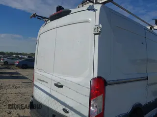 2018 Ford Transit with VIN 1FTYR1CM3JKB05523, listed as a IAAI auction lot 41918124 with 207,984 mi miles and . Bid and sale history available at DreamBid. Image 16.