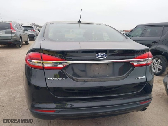2018 Ford Fusion Hybrid S with VIN 3FA6P0UU9JR100852, listed as a IAAI auction lot 41516157 with 63,458 mi miles. Bid and sale history available at carsss.com. Image 17.
