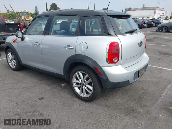 2013 MINI Countryman with VIN WMWZB3C5XDWM09519, listed as a IAAI auction lot 42665715 with 127,891 mi miles and . Bid and sale history available at DreamBid. Image 3.