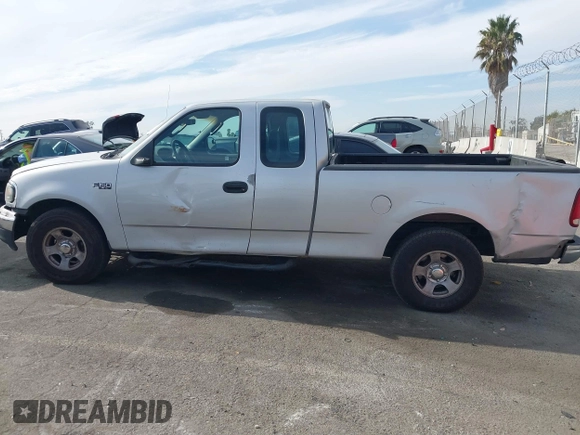 2002 Ford F-150 XL with VIN 1FTRX17262NB99755, listed as a IAAI auction lot 41181246 with 1 mi miles. Bid and sale history available at carsss.com. Image 15.