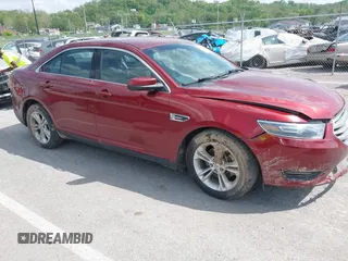 2014 Ford Taurus SEL z VIN 1FAHP2E82EG157445, wystawiony jako IAAI lot #42133676 z przebiegiem 174 616 mil mil oraz . Historia ofert i sprzedaży dostępna na DreamBid. Obrazek 1.