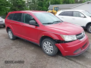 2015 Dodge Journey American Value z VIN 3C4PDCAB2FT577385, wystawiony jako IAAI lot #42324307 z przebiegiem 170 000 mil mil oraz . Historia ofert i sprzedaży dostępna na DreamBid. Obrazek 1.
