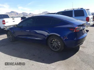 2023 Tesla Model 3 with VIN 5YJ3E1EA5PF652212, listed as a Copart auction lot 57348395 with 8,780 mi miles and Salvage title. Bid and sale history available at DreamBid. Image 2.