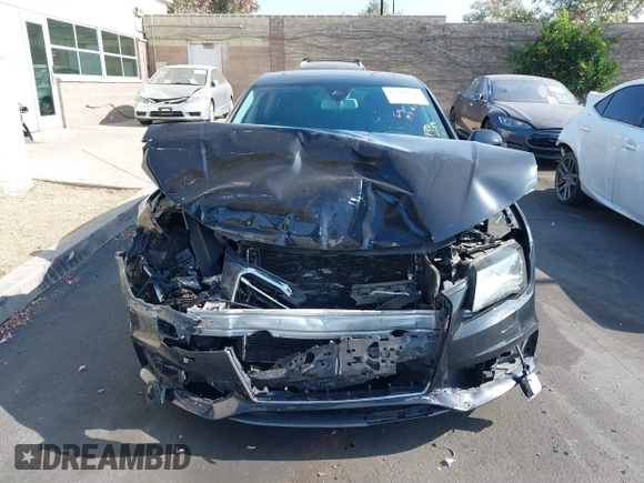 2014 Audi A7 Prestige with VIN WAU2GAFC5EN012583, listed as a IAAI auction lot 42561824 with Not provided miles and . Bid and sale history available at DreamBid. Image 13.