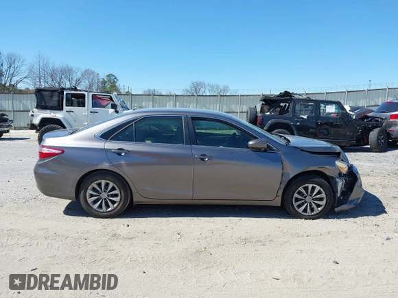 2015 Toyota Camry XLE z VIN 4T1BF1FK5FU092709, wystawiony jako IAAI lot #41859995 z przebiegiem 167 819 mil mil oraz . Historia ofert i sprzedaży dostępna na DreamBid. Obrazek 12.