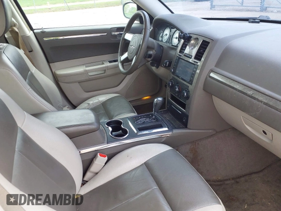 2008 Chrysler 300 Touring with VIN 2C3LA53G08H147012, listed as a IAAI auction lot 42109759 with 169,244 mi miles. Bid and sale history available at carsss.com. Image 5.