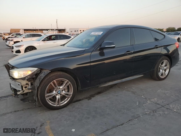 2015 BMW 3 Series Gran Turismo 335i xDrive with VIN WBA3X9C57FD868788, listed as a Copart auction lot 74597404 with NaN miles and Salvage Title. Bid and sale history available at carsss.com. Image 1.