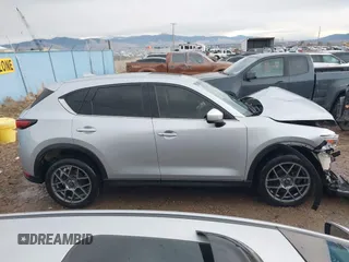2018 Mazda CX-5 Grand Touring с VIN JM3KFBDM8J0326492, выставлен на аукционе IAAI как лот 40928841 с пробегом 114 848 миль миль и . История ставок и продаж доступна на DreamBid. Изображение 14.