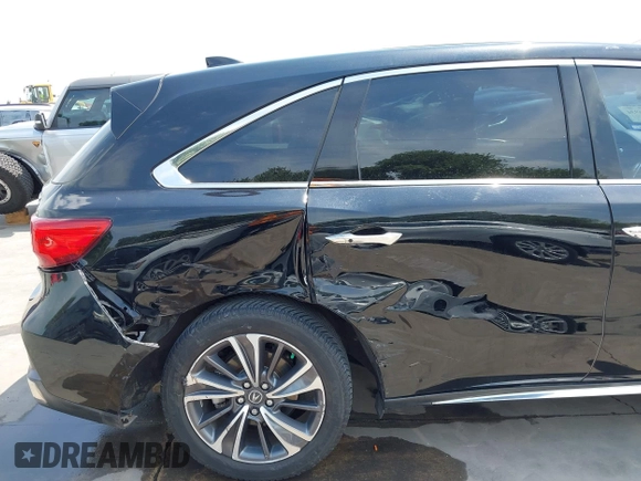 2019 Acura MDX Technology z VIN 5J8YD3H51KL000634, wystawiony jako IAAI lot #42056934 z przebiegiem 103 411 mil mil oraz . Historia ofert i sprzedaży dostępna na DreamBid. Obrazek 18.